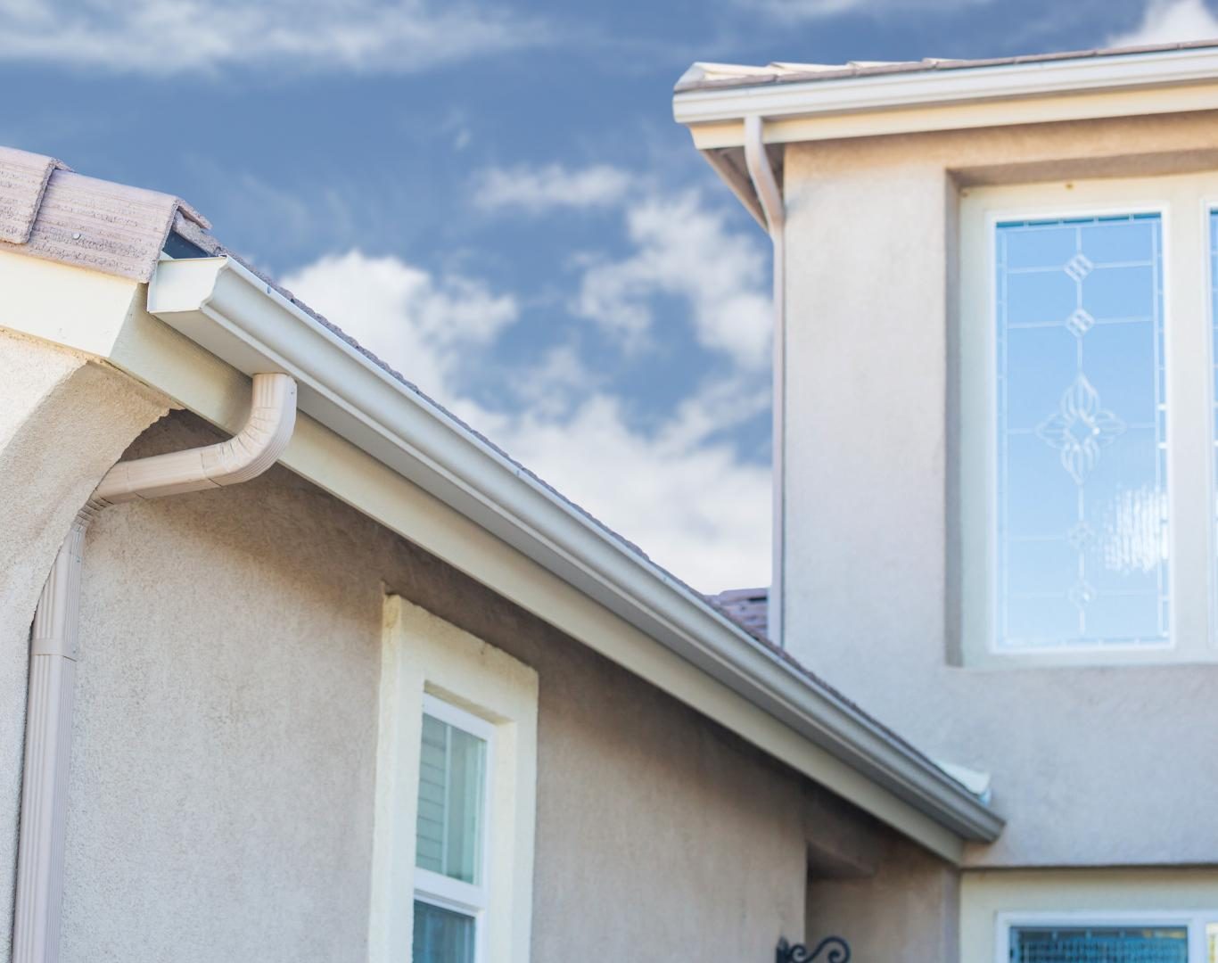 Durable rain gutters in Throop, NY safeguarding roof and foundation from runoff